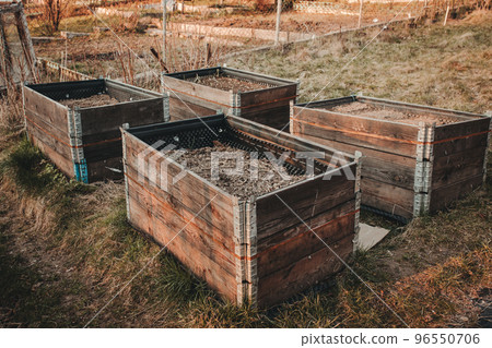 pallet collar raised beds in garden. Permaculture concept pallet collar raised beds in garden. Permaculture concept 96550706