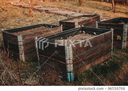 pallet collar raised beds in garden. Permaculture concept pallet collar raised beds in garden. Permaculture concept 96550708