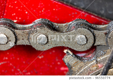 Bicycle chain link - macro. Dirty bike chain. Bicycle chain link - macro. Dirty bike chain. 96550774