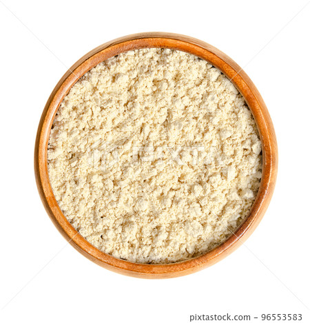 Soy flour, in a wooden bowl. Made of hulled, toasted soybeans, finely ground into a flour. Used for cooking or as the starting material for production of soy concentrate and soy protein isolate. Soy flour, in a wooden bowl. Made of hulled, toasted soybeans, finely ground into a flour. Used for cooking or as the starting material for production of soy concentrate and soy protein isolate. 96553583
