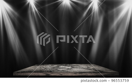 Rectangular platform podium for product presentation in the light of spotlights, on a black background. Rectangular platform podium for product presentation in the light of spotlights, on a black background. 96553759