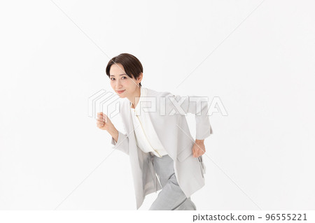 Running woman white background Running woman white background 96555221