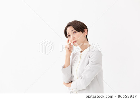 Worried woman white background Worried woman white background 96555917