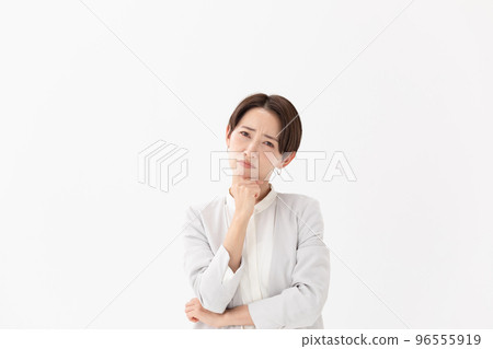 Worried woman white background Worried woman white background 96555919