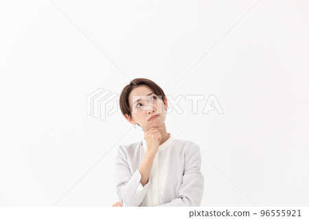 Worried woman white background 96555921