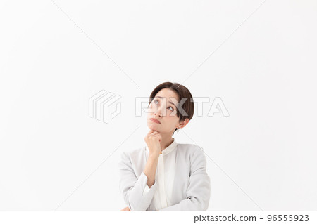 Worried woman white background 96555923