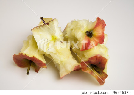 Red apple stumps on a white Red apple stumps on a white 96556371