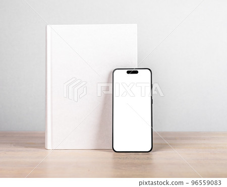 Book cover mock up and iphone 14, smart phone mockup on wood table 96559083