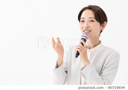 Woman holding a microphone White background 96559694