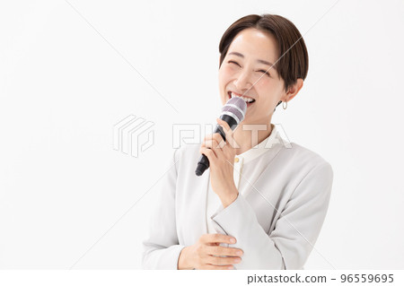 Woman holding a microphone White background 96559695