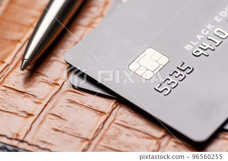 Credit card over notepad Credit card over notepad 96560255