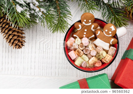 Gingerbread man cookies in a cup with marshmallow Gingerbread man cookies in a cup with marshmallow 96560362
