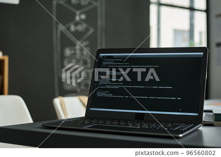 Close-up of laptop with new software standing on table in the classroom Close-up of laptop with new software standing on table in the classroom 96560802