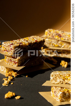 Homemade Granola energy bar. Variety of homemade protein granola breakfast bars, with nuts, raisins dried cherries and chocolate. Healthy nutrition eating Gluten free cereal dieting snack super food 96562836
