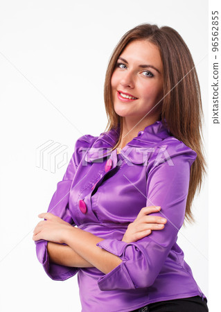Young beautiful brunette woman in purple dress, isolated on white background 96562855