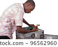 Technician fixing the computer in the office 96562960