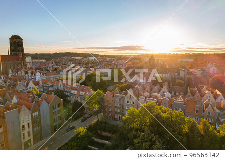 Beautiful architecture of old town in Gdansk, Poland at sunny day. Aerial view from drone of the Main Town Hall and St. Mary Basilica. City Architecture from Above. Europe Beautiful architecture of old town in Gdansk, Poland at sunny day. Aerial view from drone of the Main Town Hall and St. Mary Basilica. City Architecture from Above. Europe 96563142