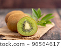 A half of fresh green kiwi 96564617