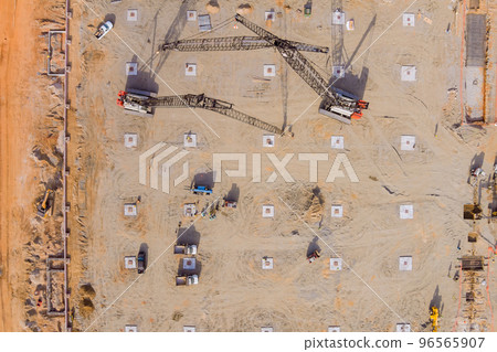 During construction process lot of heavy equipment is used on construction site 96565907