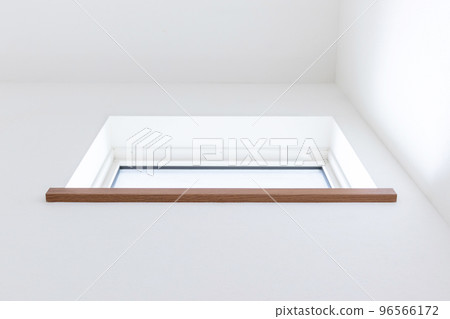 A small window for daylighting on a white wall A small window for daylighting on a white wall 96566172