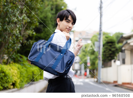 high school boy going to school 96568508