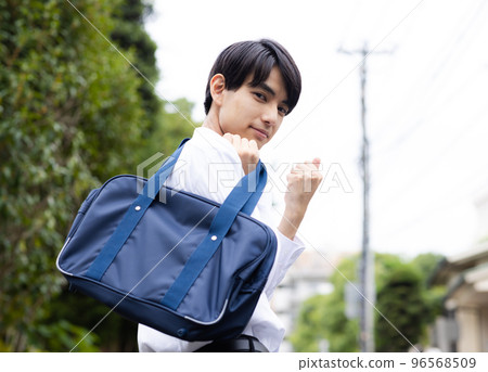 high school boy going to school high school boy going to school 96568509