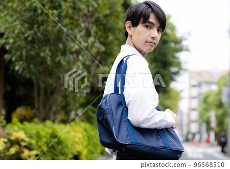 high school boy going to school high school boy going to school 96568510