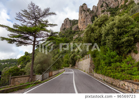 Scenic Road by Rocky Cliffs and Mountain Landscape on the Tyrrhenian Sea. Amalfi Coast, Italy. Scenic Road by Rocky Cliffs and Mountain Landscape on the Tyrrhenian Sea. Amalfi Coast, Italy. 96569723