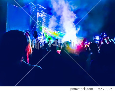 Crowd raising their hands and enjoying great festival party or concert. 96570096