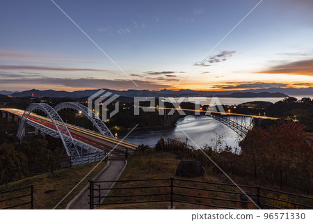 Dawn over the old and new Saikaibashi bridges seen from the observatory of Saikai no Oka Park 96571330