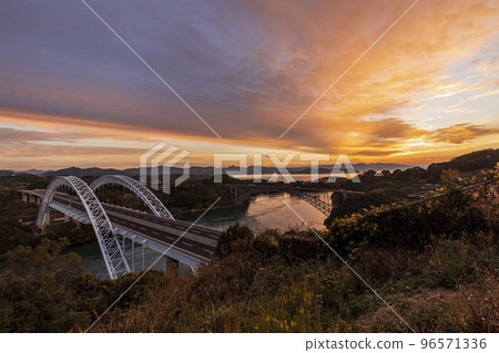 Dawn over the old and new Saikaibashi bridges seen from the observatory of Saikai no Oka Park 96571336