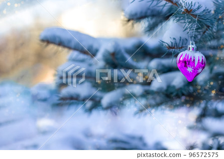 Christmas blue spruce covered with snow outdoors on a clear winter day. Decorated with festive decor - pink heart. Happy New Year 2023 and Merry Christmas. Happy Valentine's Day. Postcard. Copy space Christmas blue spruce covered with snow outdoors on a clear winter day. Decorated with festive decor - pink heart. Happy New Year 2023 and Merry Christmas. Happy Valentine's Day. Postcard. Copy space 96572575