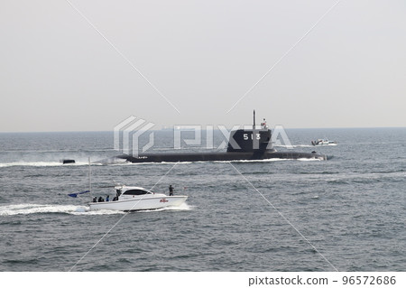 A submarine of the Maritime Self-Defense Force running alongside a boat A submarine of the Maritime Self-Defense Force running alongside a boat 96572686