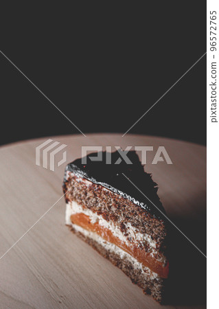 Dessert and sweet food, slice of layered cake with cream, caramel and chocolate as holiday treat recipe idea Dessert and sweet food, slice of layered cake with cream, caramel and chocolate as holiday treat recipe idea 96572765