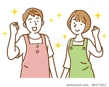 Young men and women who pose in an apron 96573022