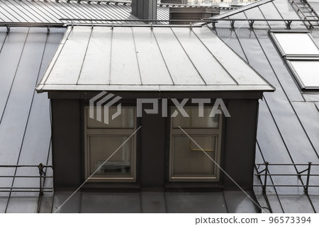 Metal roof and attic windows, modern architecture 96573394