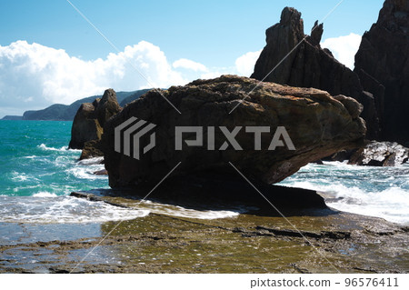Hashigui-iwa Rock and Tsunami-iwa Rock in Autumn Sky Hashigui-iwa Rock and Tsunami-iwa Rock in Autumn Sky 96576411