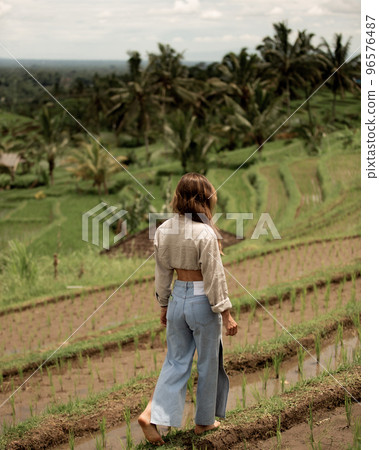 girl posing on the background of rice teresa girl posing on the background of rice teresa 96576487