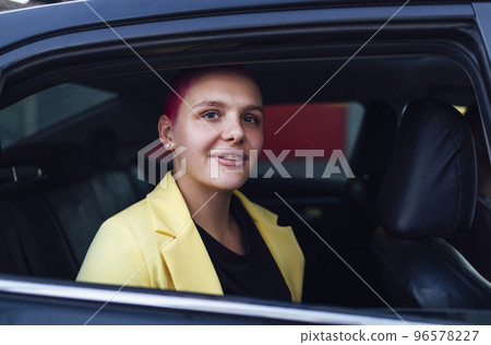 Female businesswoman looking at camera. Female businesswoman looking at camera. 96578227