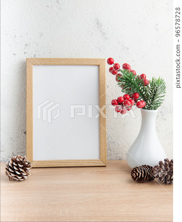 White blank wooden frame mockup with Christmas decorations White blank wooden frame mockup with Christmas decorations 96578728