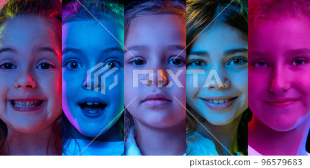 Children's emotions. Set of portraits of cute kids, charming little girls isolated on multicolored background in neon light. Wow emotions, facial expression and carefree childhood concept. Children's emotions. Set of portraits of cute kids, charming little girls isolated on multicolored background in neon light. Wow emotions, facial expression and carefree childhood concept. 96579683