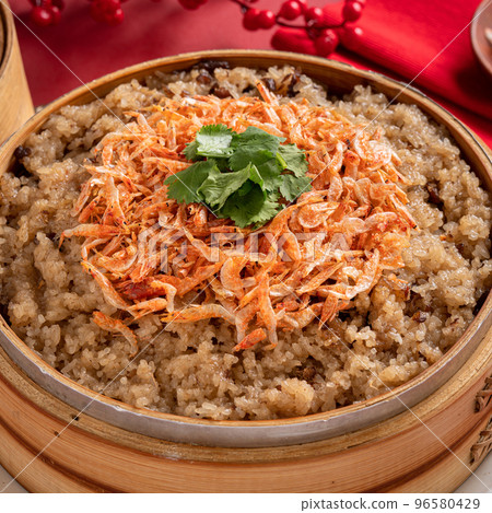 Delicious Chinese glutinous sticky oil rice cake named migao for lunar new year's dishes. 96580429