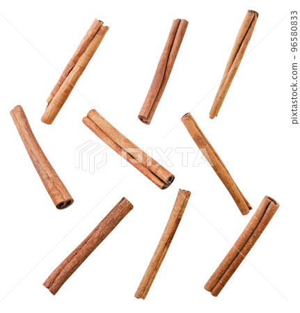 Set of cinnamon sticks cut out on a white background. Isolated Set of cinnamon sticks cut out on a white background. Isolated 96580833
