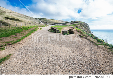 Beautiful views of nature on way to Durdle door in Lulworth, Dorset, United Kingdom. Part of Jurassic Coast World Heritage Site, view of stone formations and sea, selective focus 96581055