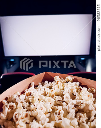 Cinema and entertainment, popcorn box in the movie theatre for tv show streaming service and film industry production branding 96582815