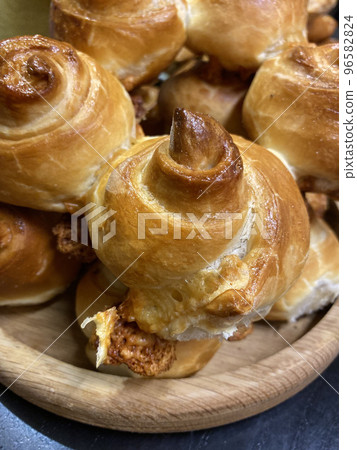 Fresh homemade puff pastry buns. Vertical photo format. Fresh homemade puff pastry buns. Vertical photo format. 96582824