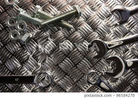 Spanners With Steel Nuts And Bolts On Tread Plate Spanners With Steel Nuts And Bolts On Tread Plate 96584270