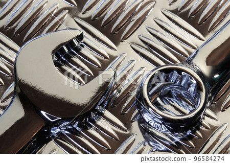Chrome Spanner Heads On Metal Tread Plate 96584274
