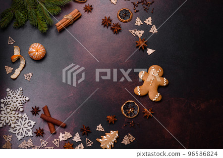 Christmas pie stollen with marzipan, berries and nuts on a dark concrete background 96586824