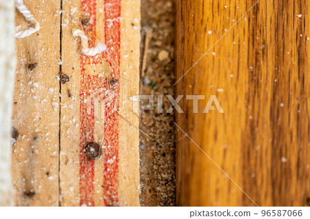 Carpet tack strip exposed during a flooring home improvement project Carpet tack strip exposed during a flooring home improvement project 96587066